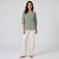 Mara Women's Blouse - studio model shot on neutral grey backdrop